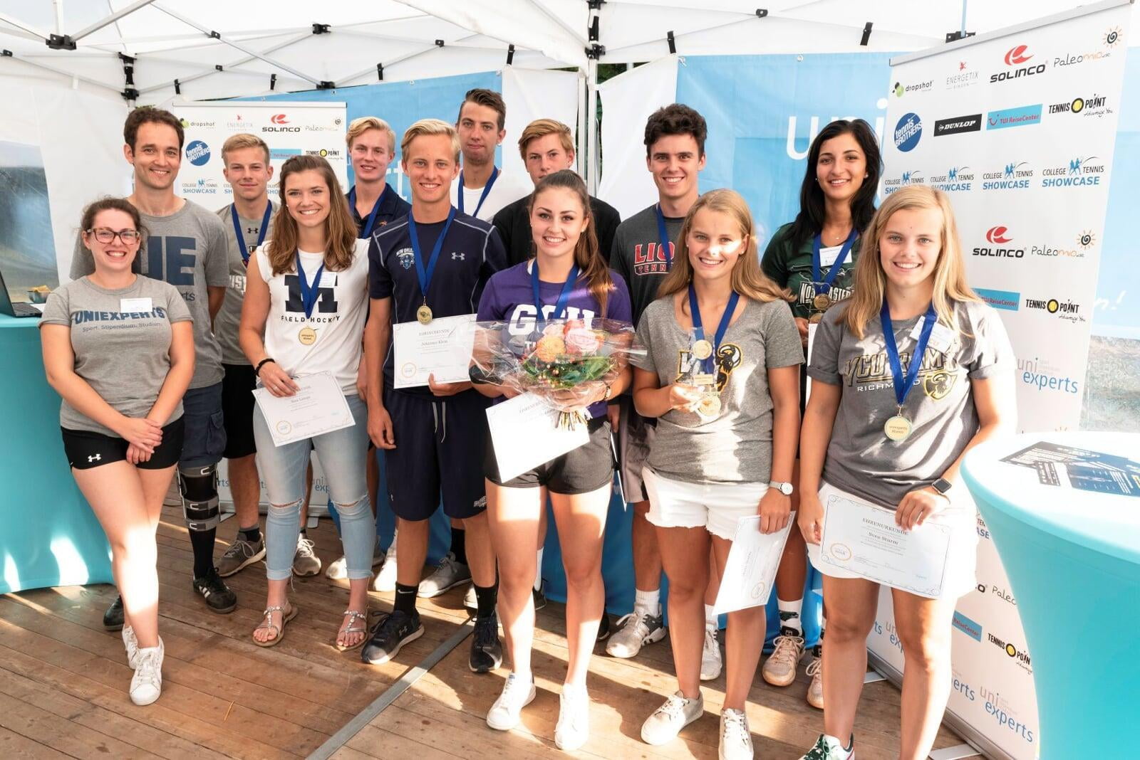 college athletes at an award ceremony